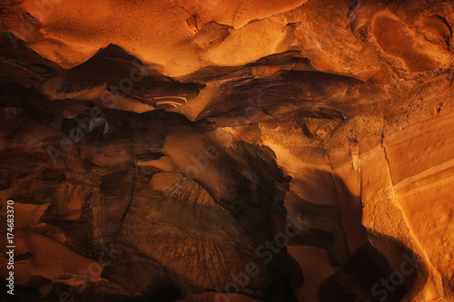 image of beautiful golden light through the cave entrance