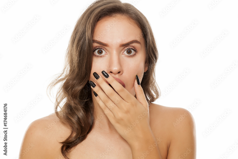 Portrait of beautiful young shocked woman on white background Portrait of beautiful young shocked woman on white background