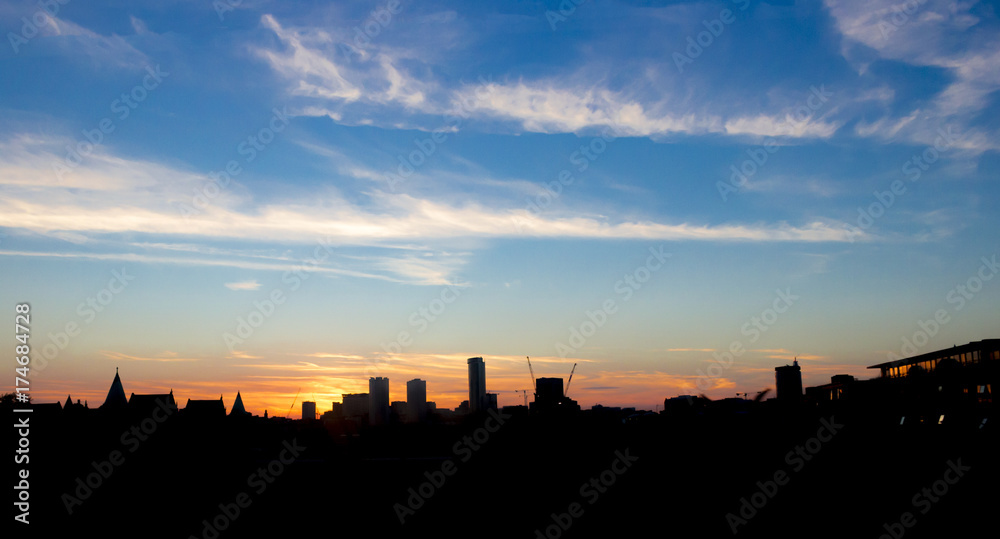 big city skyline at sunset