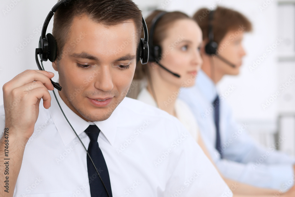 Young business man in headset. Call center Young business man in headset. Call center