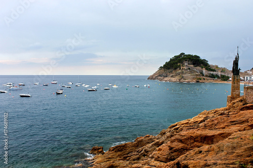 Views of the Vila Vella, a fortress in Tossa de Mar, Catalonia, Spain, with a statue of Minerva, Roman goddess of wisdom, in the foreground