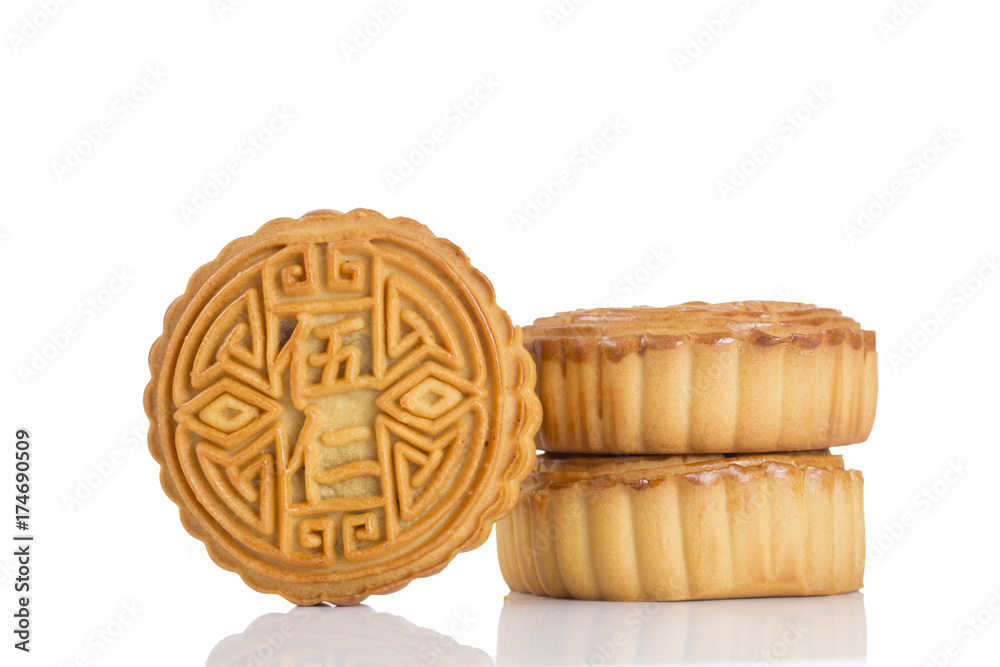 Mooncake isolated on the white table. Chinese mid autumn festival food. Mooncake isolated on the white table. Chinese mid autumn festival food.