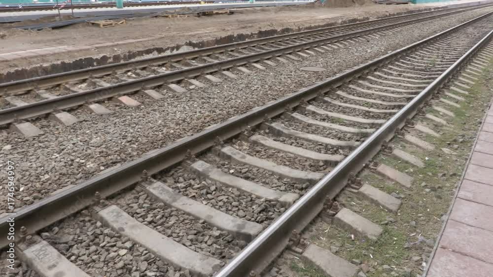 Railway tracks at the station. Rails and sleepers. Railway tracks at the station. Rails and sleepers.