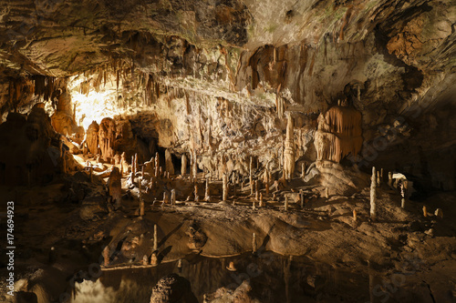 Postojna Cave (Slovenian: Postojnska jama; Italian: Grotte di Postumia) is a 20,570 m long Karst cave system photo