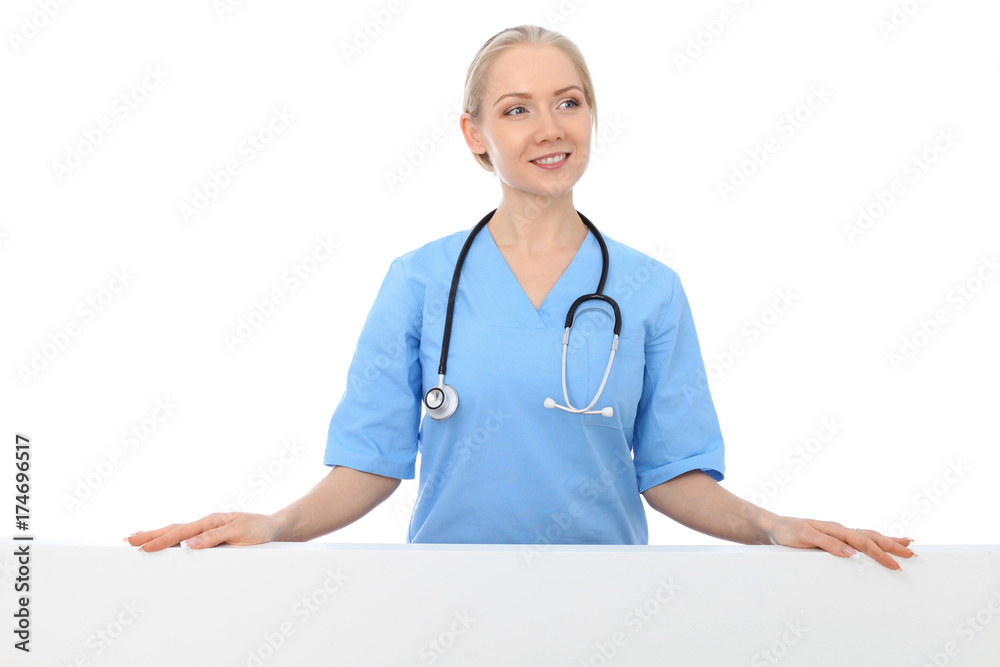 Smiling young doctor or nurse portrait isolated over white background. Smiling young doctor or nurse portrait isolated over white background.