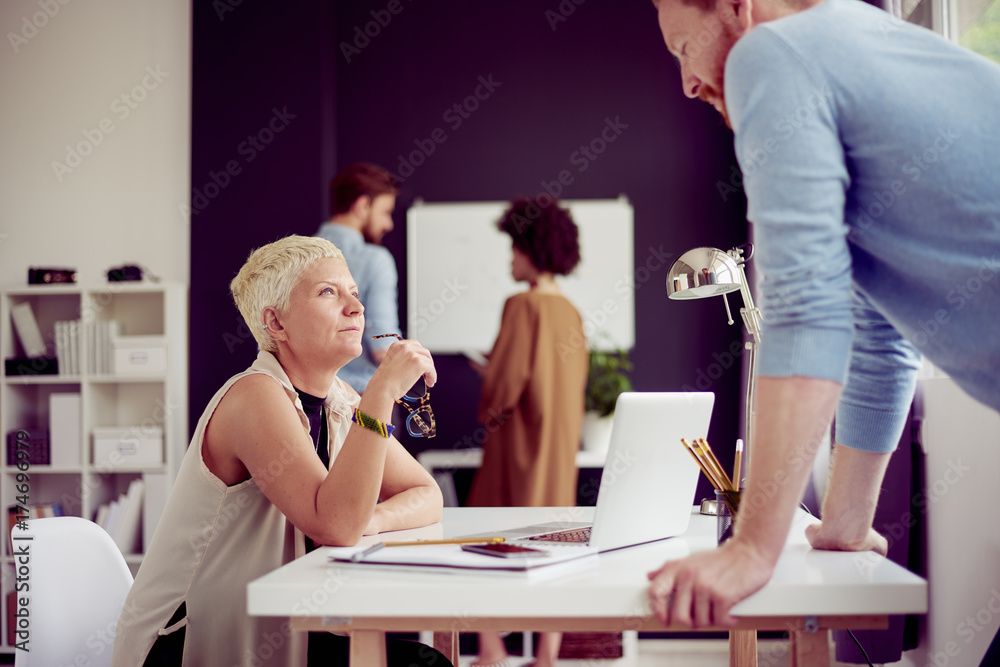 Multi ethnic team working at modern office space Multi ethnic team working at modern office space