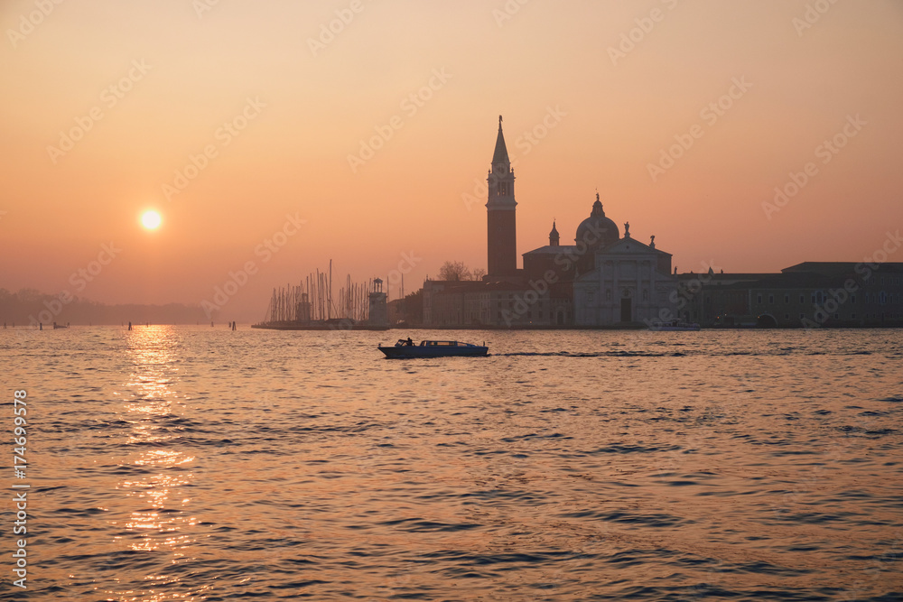 Morning sun, taxi boat and San Giorgio Maggiore church