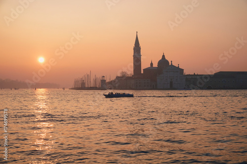 Morning sun, taxi boat and San Giorgio Maggiore church