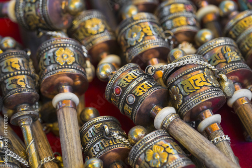 Tibetan praying objects for sale at a souvenir shop in Ladakh, India.