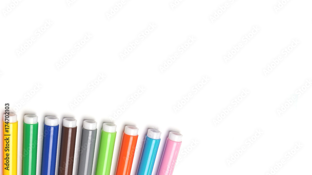 Fototapeta premium Varicoloured markers on the white isolated background.