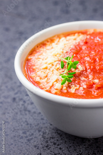 Roasted tomato and basil soup. Selective focus, space for text.