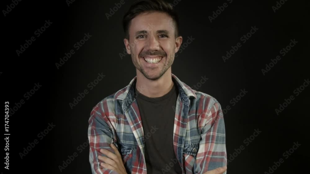 Portrait of a happy laughing man, close-up. Happy man on black background Portrait of a happy laughing man, close-up. Happy man on black background