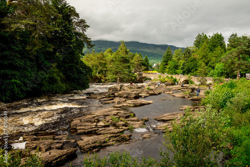 Running falls of Dochart in a town of Killin in central Scotland photo