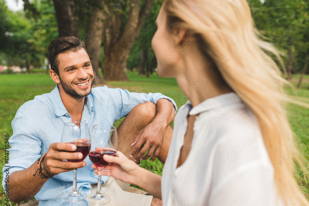 couple clinking glasses of wine couple clinking glasses of wine
