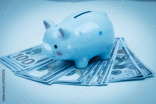 Piggy bank on money concept for business finance, inve photo