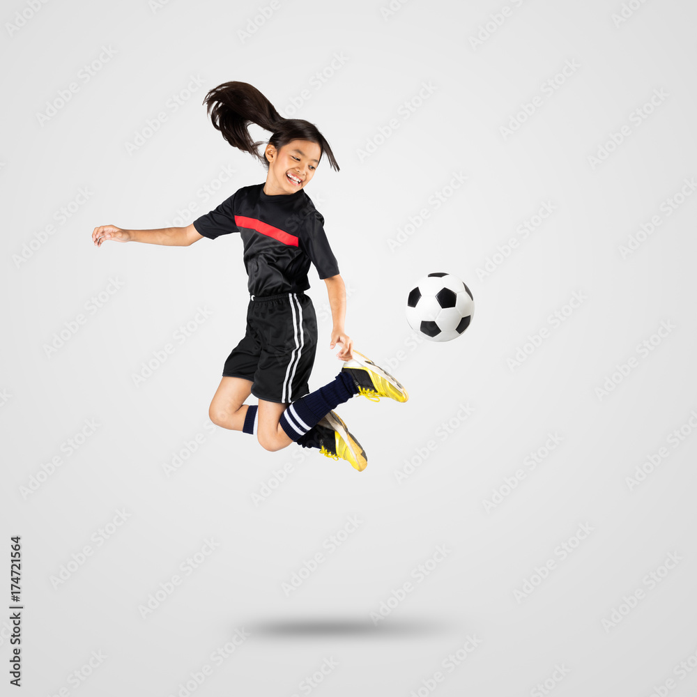 Young asian girl soccer player, Isolated on grey background