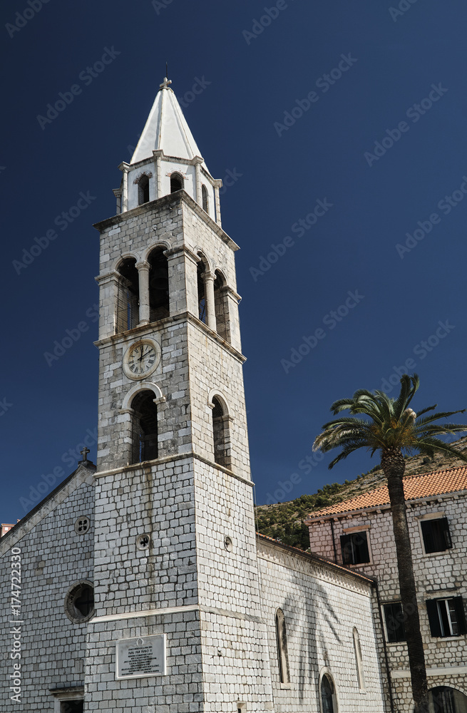 Obraz premium Tower of medieval church in the town of Dubrownik in Croatia.