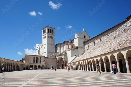 Basilica of San Francesco d'Assisi in Italy - main patio and church entrance photo