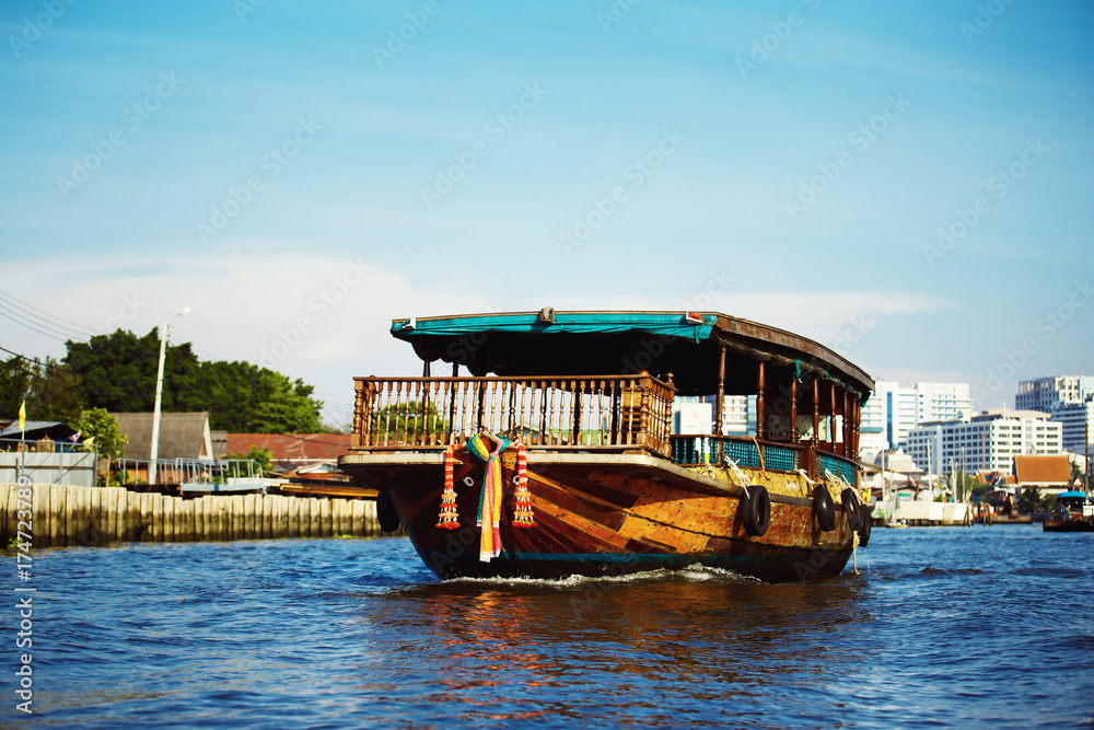 Fototapeta premium Image of tourist boat ar Bangkok river background.