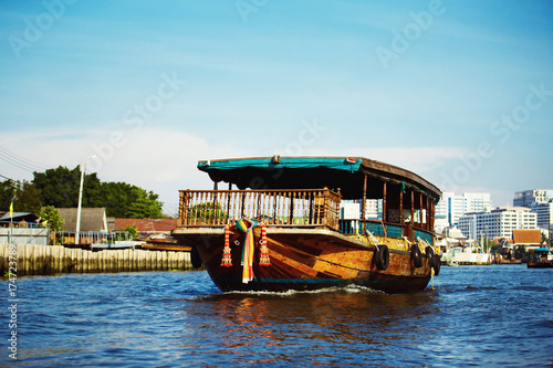 Image of tourist boat ar Bangkok river background.