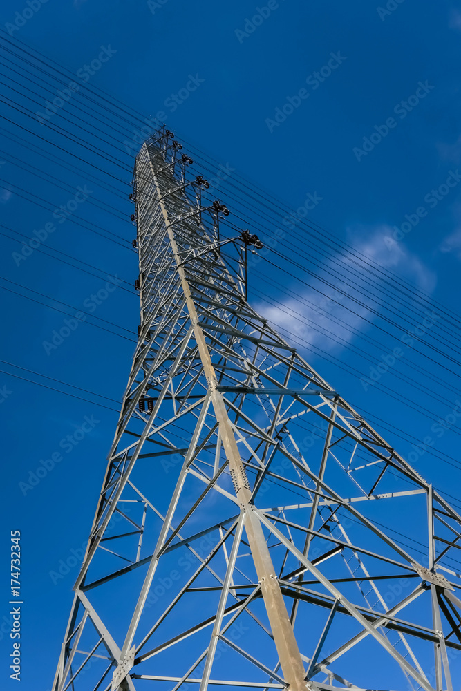 electricity post with blue sky. electricity post with blue sky.