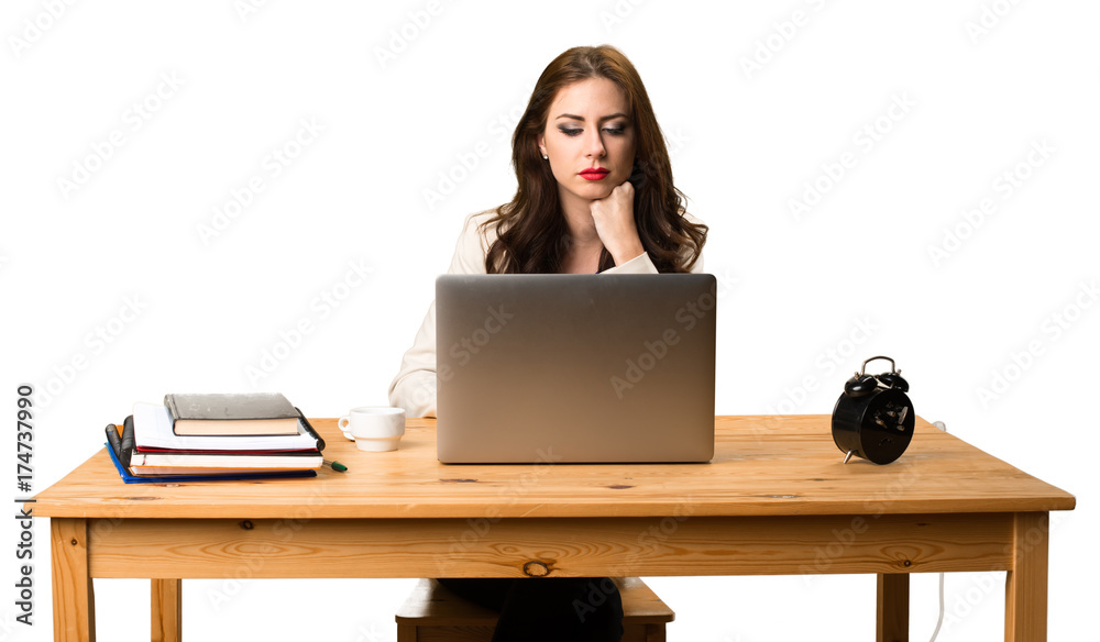 Business woman working with her laptop Business woman working with her laptop