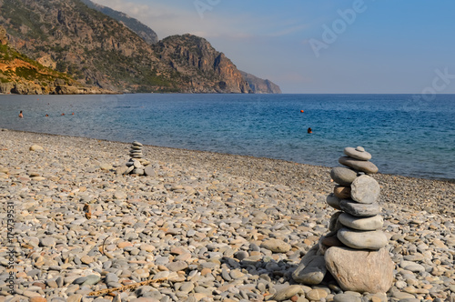 Fototapeta Naklejka Na Ścianę i Meble -  View of the pebble beach of Paleochora