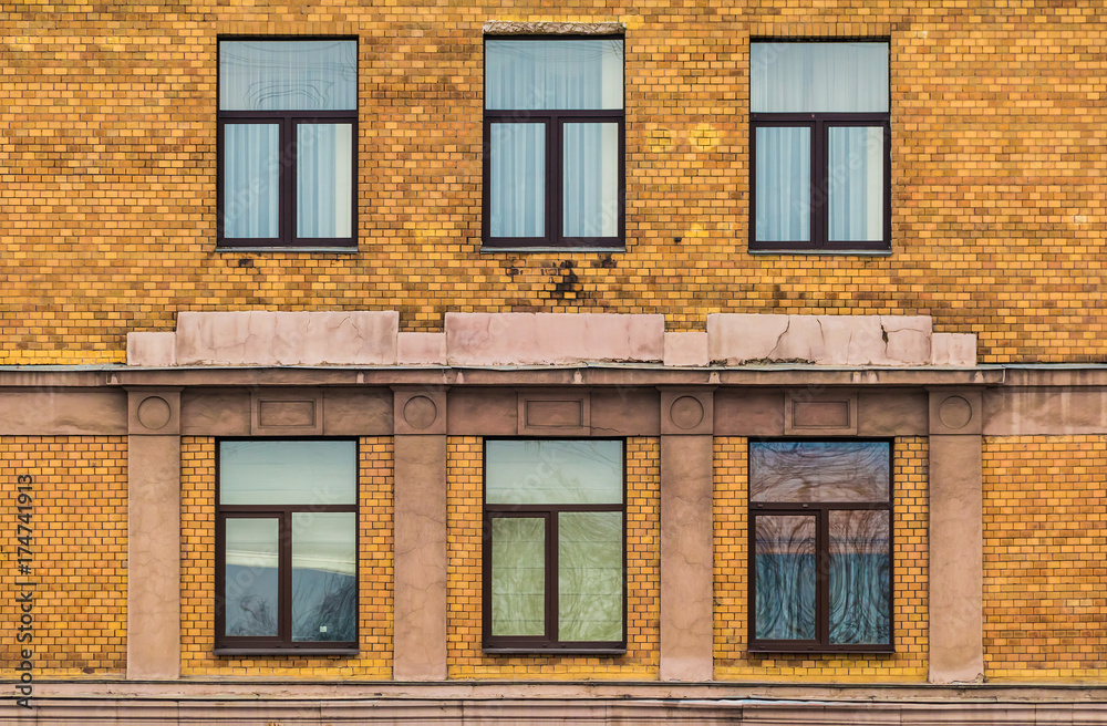 Windows in a row on facade of apartment building