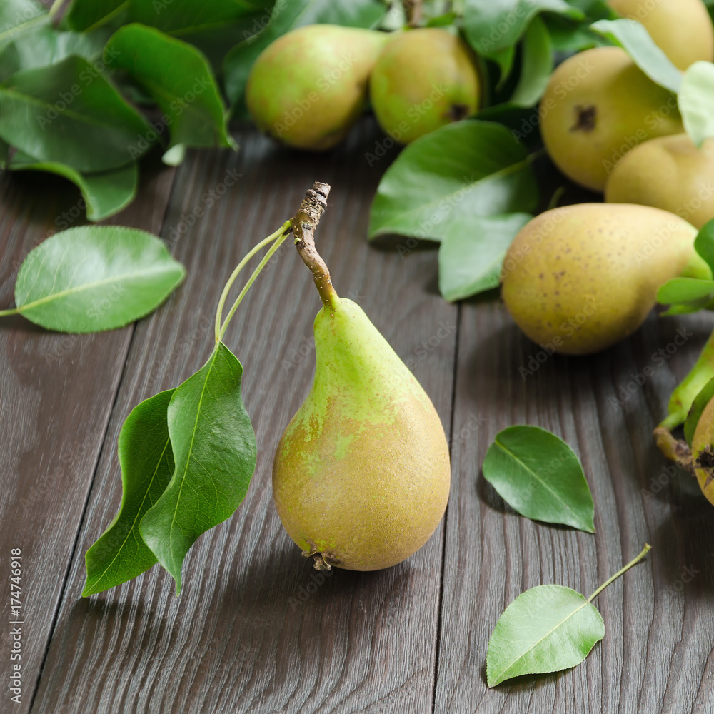 Pears on dark wooden background Pears on dark wooden background