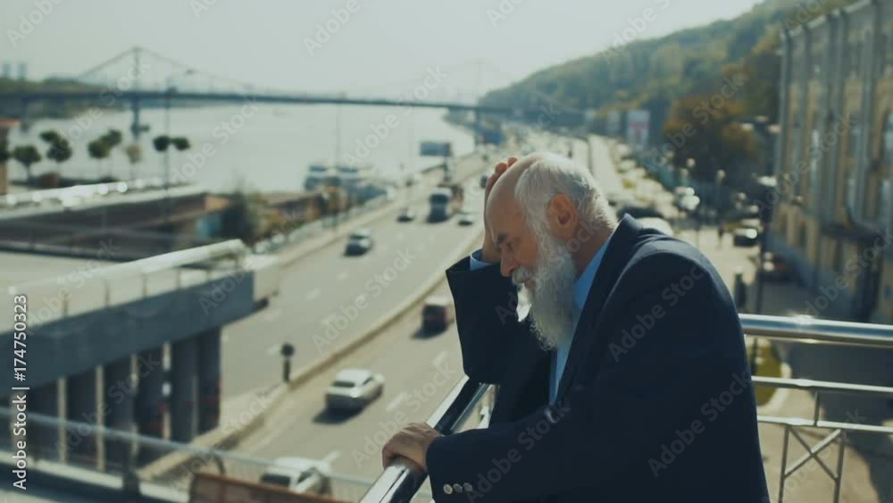 Pleasant old man enjoys view on river - slowmotion Pleasant old man enjoys view on river - slowmotion