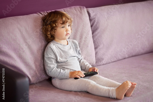 Toddler kid watching tv cartoons.