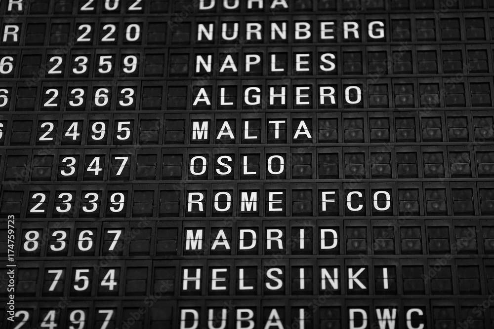 Departures board at the airport. Flight information mechanical timetable. Split flap mechanical departures board. Flight schedule Departures board at the airport. Flight information mechanical timetable. Split flap mechanical departures board. Flight schedule