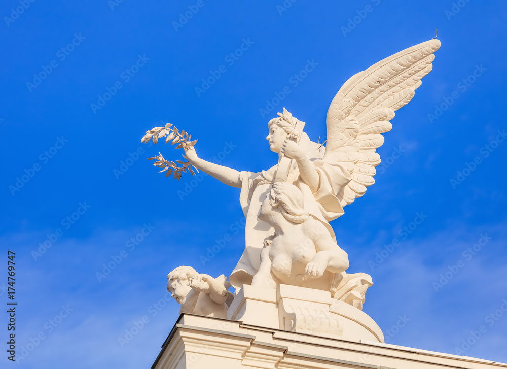 Sculpture on the top of the Zurich Opera House building in the city of Zurich, Switzerland Sculpture on the top of the Zurich Opera House building in the city of Zurich, Switzerland