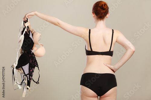 woman choosing bras to wear