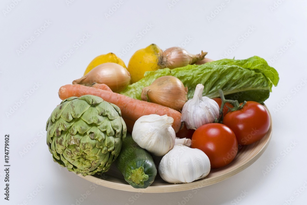 Wooden bowl with various vegetables and salad Wooden bowl with various vegetables and salad