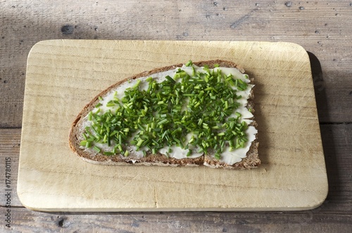 Bread with butter and chives photo