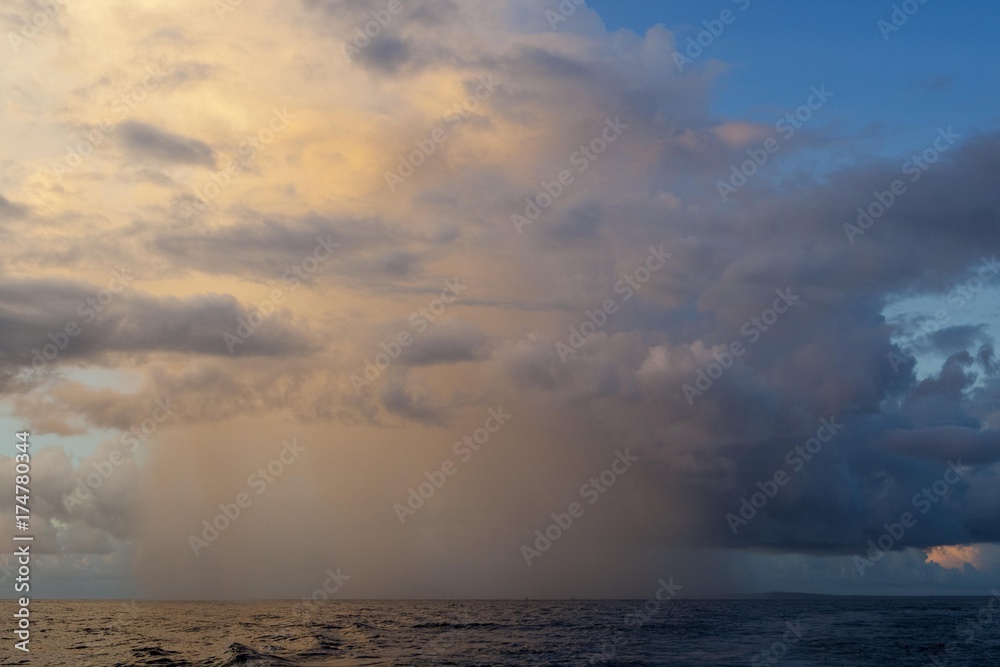 Storm, rain shower and thunderstorm over the sea