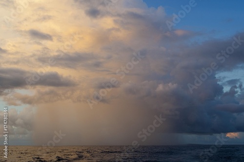 Storm, rain shower and thunderstorm over the sea