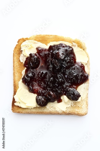 Slice of toast, toasted slice of bread, with cherry jam