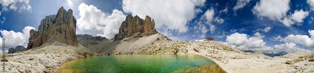 360 panoramic view of the Pisciadu peak and a hut on the Sella massif from Lake Pisciadu, Passo Gardena, province of Bolzano-Bozen, Italy, Europe