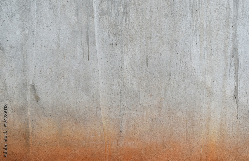 Fototapeta premium orange soil on dirty old concrete for background
