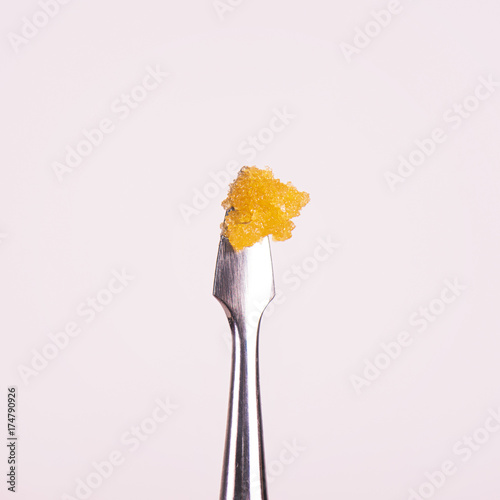 Cannabis concentrate live resin (extracted from medical marijuana) on a dabbing tool