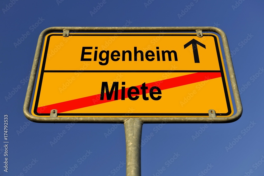 City limit sign, symbolic image for the way from Miete to Eigenheim, German for going from paying rent to owning your own home City limit sign, symbolic image for the way from Miete to Eigenheim, German for going from paying rent to owning your own home