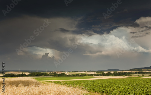 Thick storm clouds gathering over a farming area, Bavaria, Germany, Europe photo