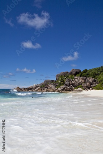 Lonely beach of Grand Anse, with the typical granite rocks of La Digue, La Digue Island, Seychelles, Indian Ocean, Africa