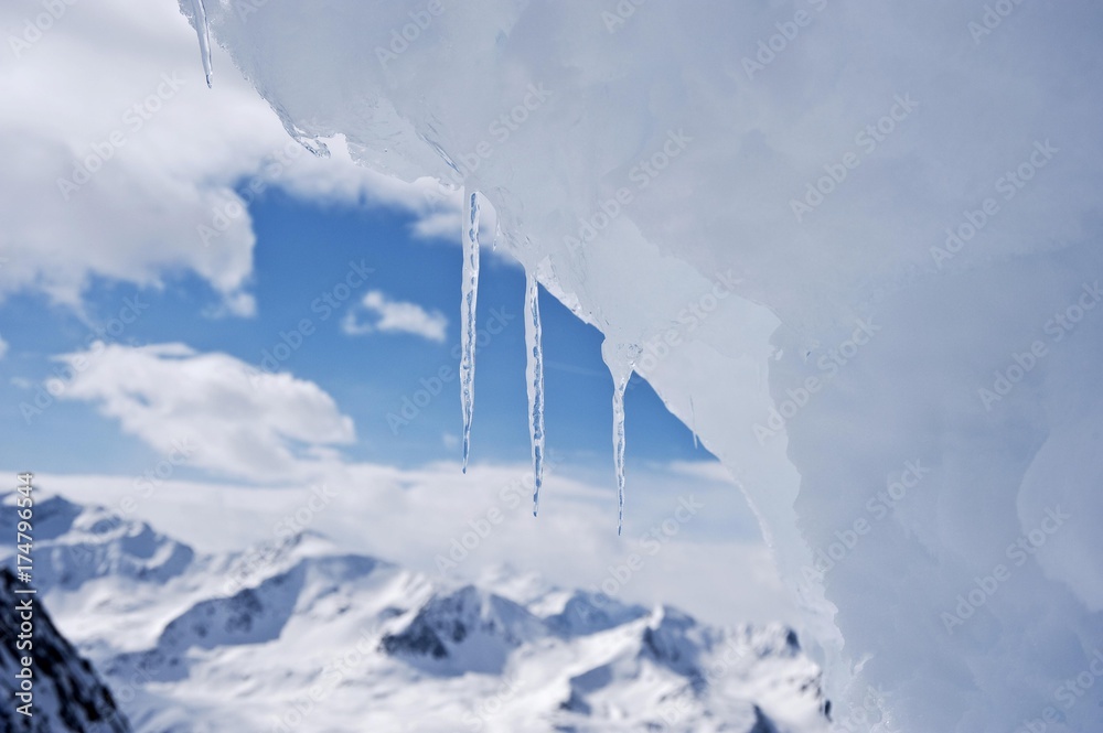 Icicles on snow drift in front of mountain landscape, Obergurgl, Hochgurgl, Oetztal Valley, Tyrol, Austria, Europe Icicles on snow drift in front of mountain landscape, Obergurgl, Hochgurgl, Oetztal Valley, Tyrol, Austria, Europe
