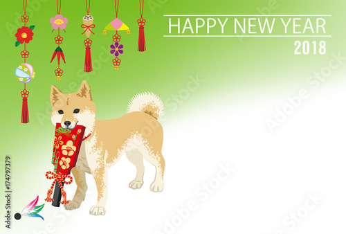 英語賀詞　2018年　年賀状　羽子板を咥える柴犬　吊るし飾り背景