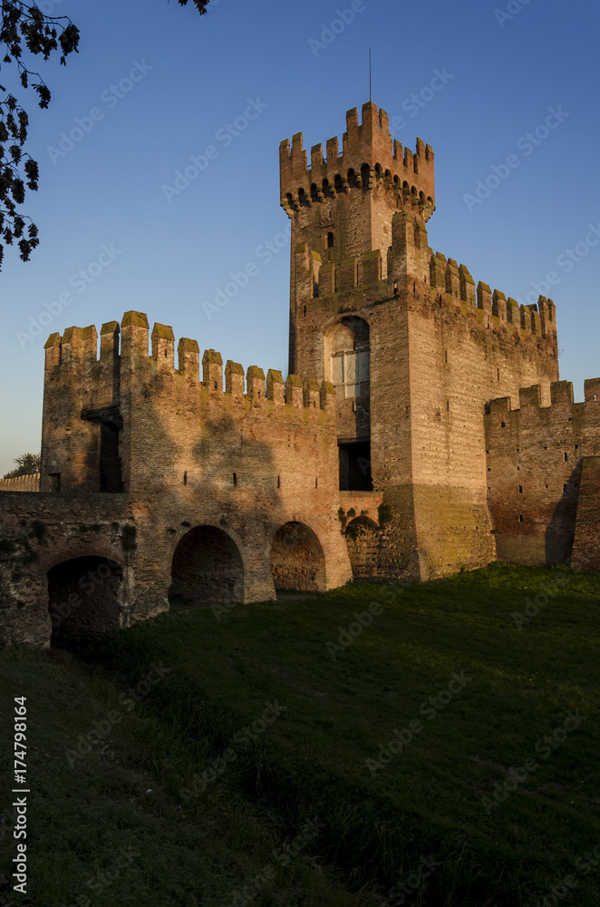 the castle tower, view of the external wall of a castle with a tower
