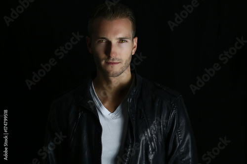 Handsome vampire wearing a leather jacket 