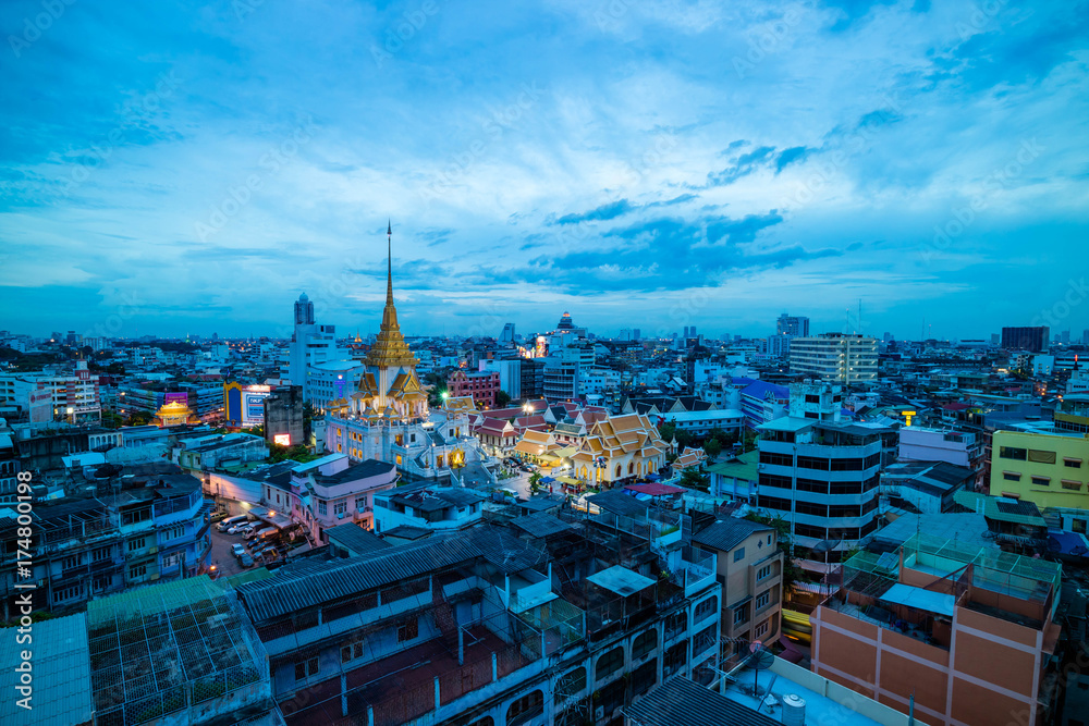 Bangkok cityscape skyline, Thailand. Modern tower and local building, temple at twilight evening